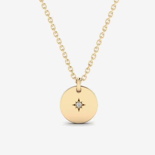Collier à pendentif pièce de monnaie étoile du Nord avec accents de diamants en or 14 carats