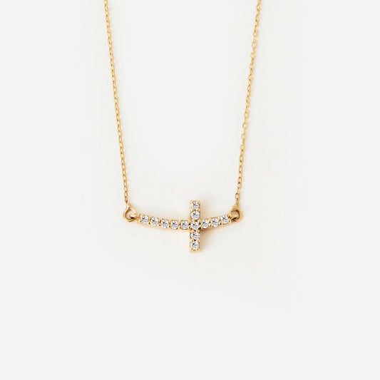 Collier croix courbée en diamants en or 585
