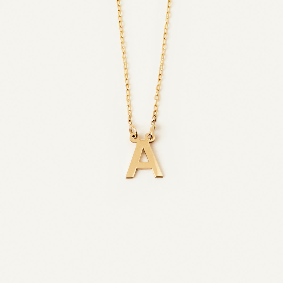 Individual delicate initial necklace in 585 gold