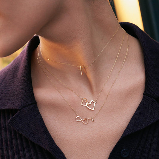 Délicat collier croix en or massif 585