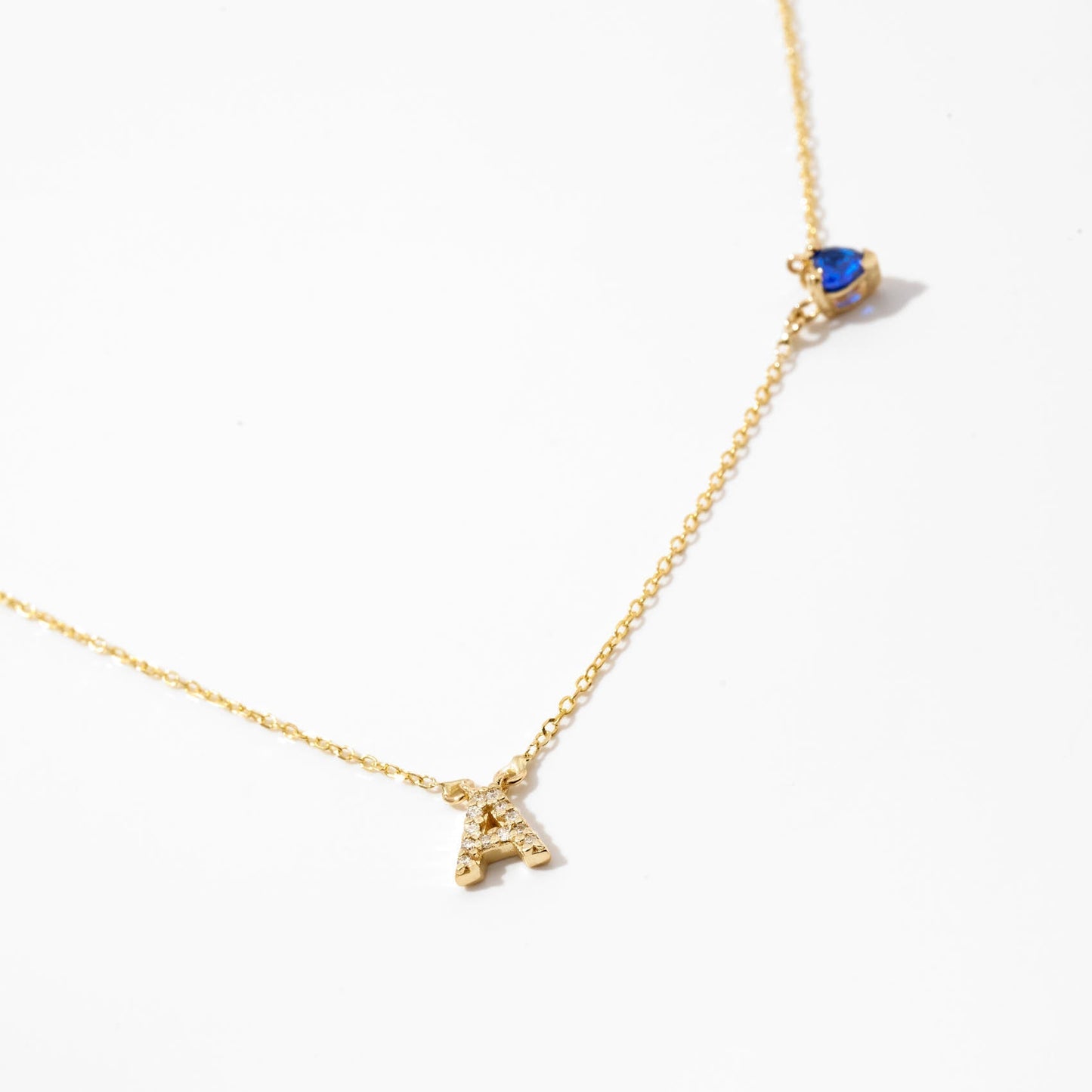 Diamant-Initiale mit Geburtsstein