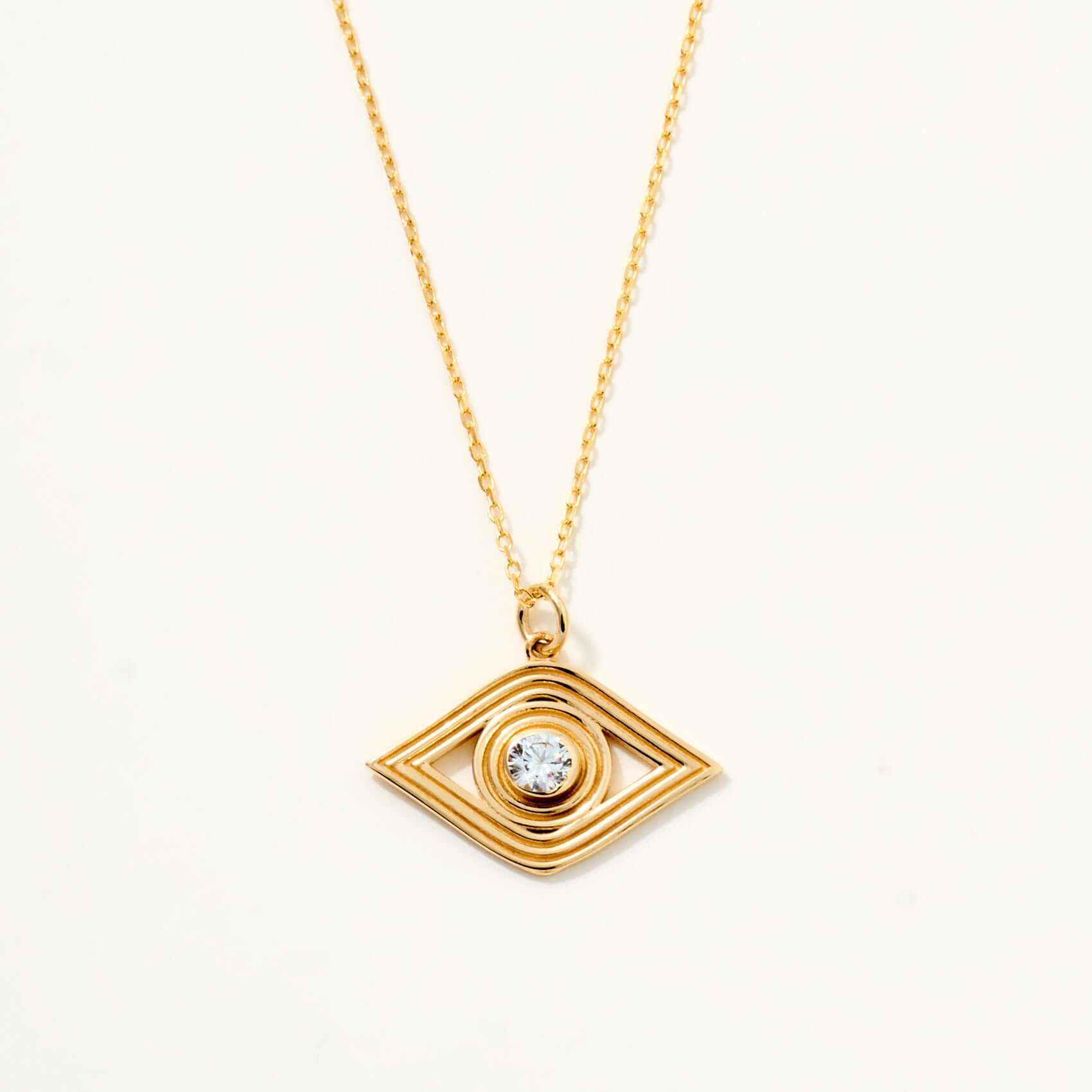 Solid gold evil eye discount