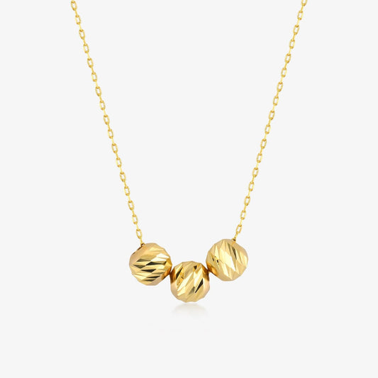 Collier pendentif à trois perles en or 585