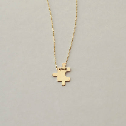 puzzle piece pendant necklace made of 585 gold