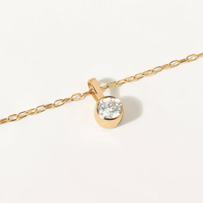 Collier pendentif solitaire diamant avec lunette en or jaune 585