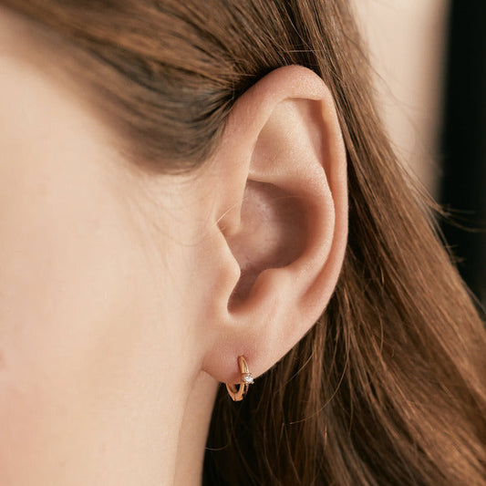 Diamond solitaire hoop earrings in 585 solid gold